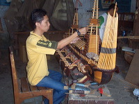 miniature-ship-hand_1f86290